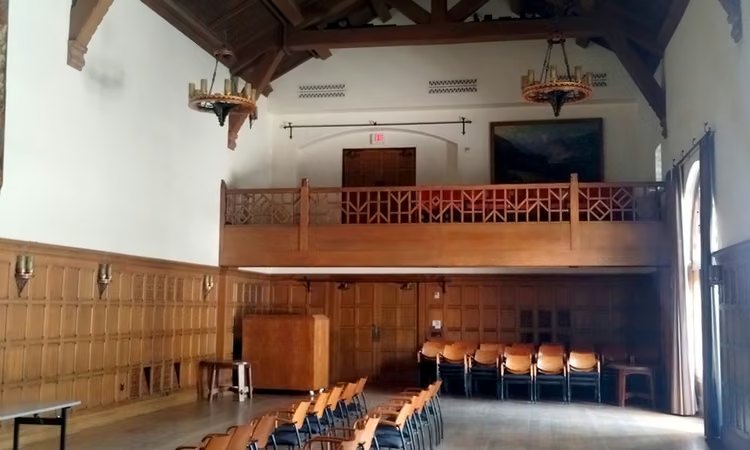 Dabney Lounge today, looking toward the balcony, with rows of chairs set for a lecture.